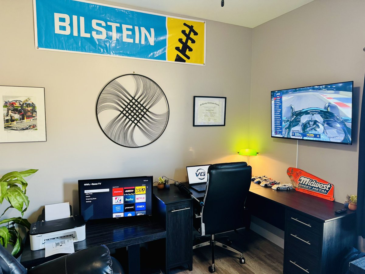 A couple cool pieces in my office… first Red Bull Racing cup series win with Brian Vickers and the spoiler side off the Eldora Million winning car with Jonathan Davenport. Starting to build a diecast collection as well.
