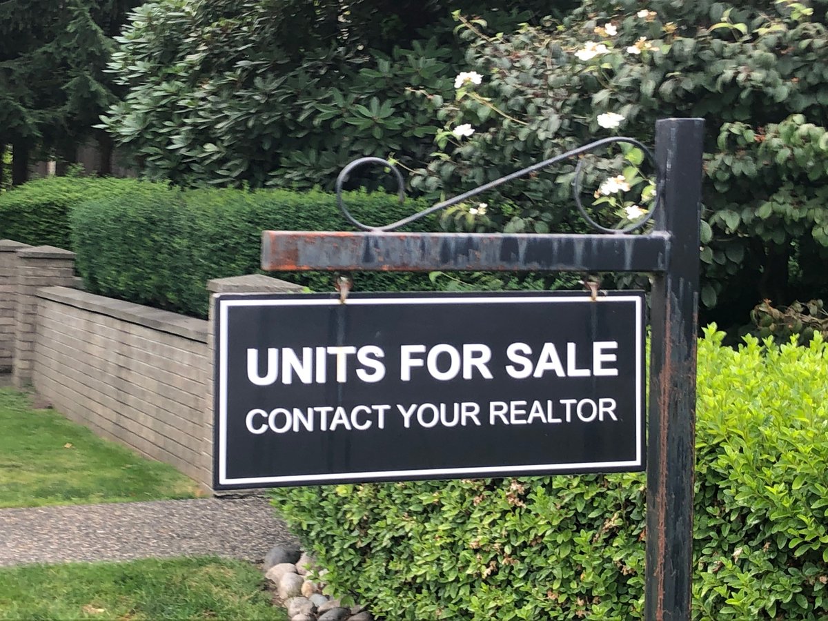 Whoa! REALTOR® is a registered trademark owned by National Association of Realtors. This sign is infringing on that trademark.