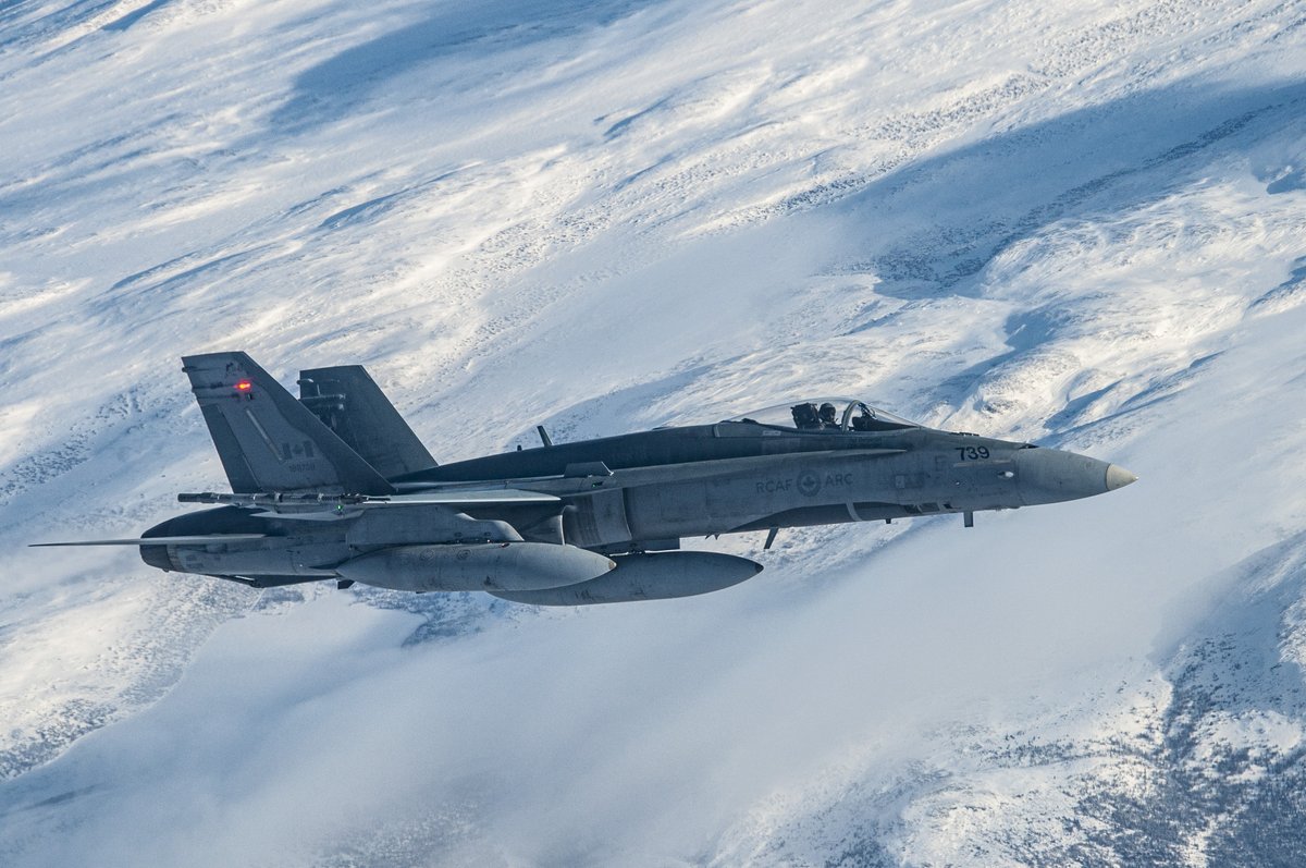 RCAFOperations's tweet photo. From 28 Jan to 11 Feb, @RCAF_ARC CF-18 Hornets, a CC-150 Polaris, and a CH-149 Cormorant deployed in the Arctic during Op #NobleDefender, an Op designed to strengthen #NORAD’s capacity to protect North America from airborne and maritime threats #WeHaveTheWatch @NORADCommand https://t.co/l8gz9et7wL