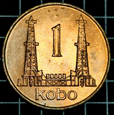 CoinOfNote's tweet photo. Can you guess the Mystery Coin? #WhatIsIt? Tell us! It's a bronze coloured coin. "1" between two ... towers?, "Kobo" below.

Don't forget to subscribe to the fortnightly newsletter to find out the answer (&amp; next #MysteryCoin first! https://t.co/1KEEHgtHfy

#Numismatics #Coins https://t.co/TMyFeHWZMl
