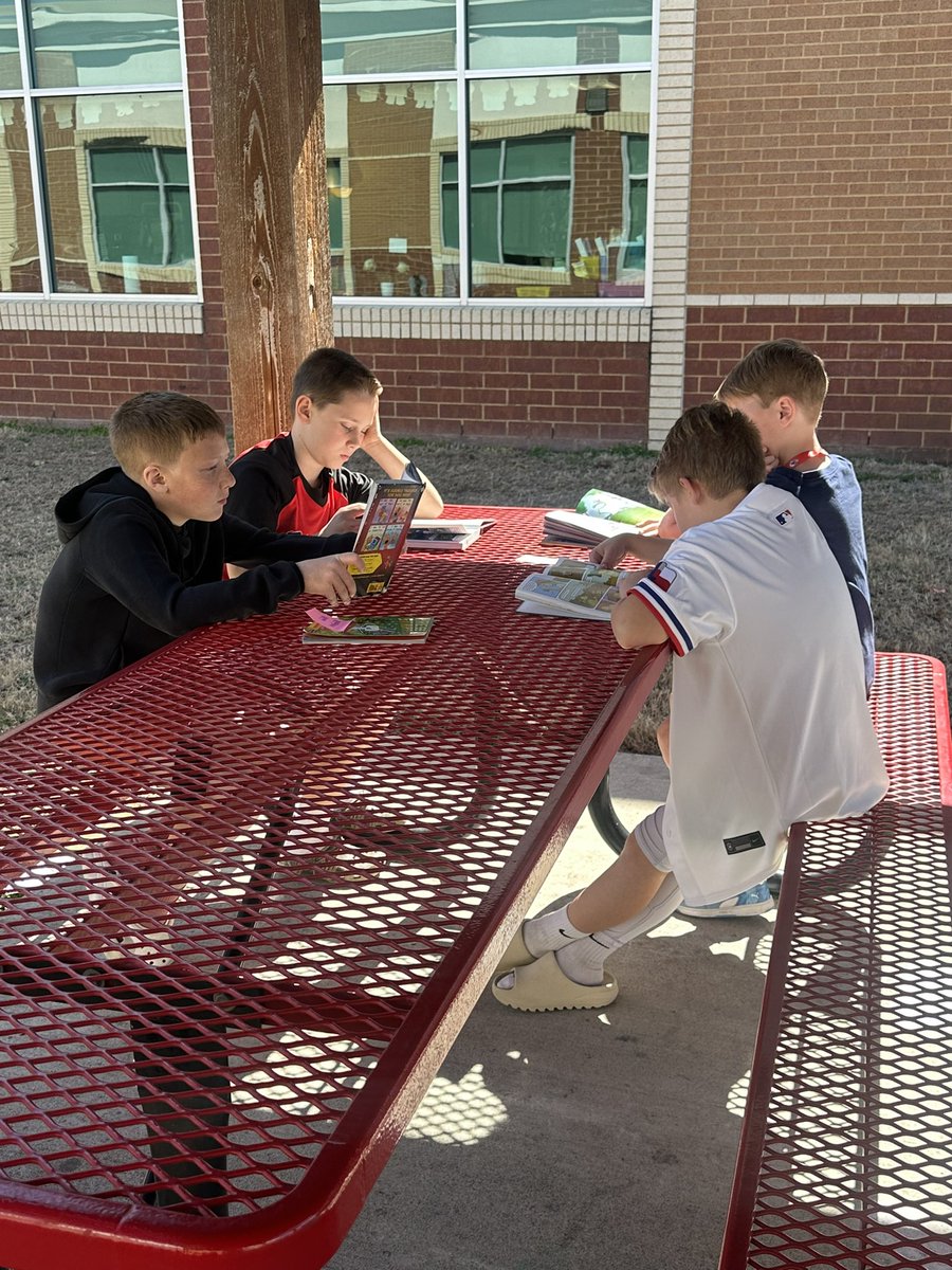 Taking advantage of the beautiful weather today, and reading outside! 📖