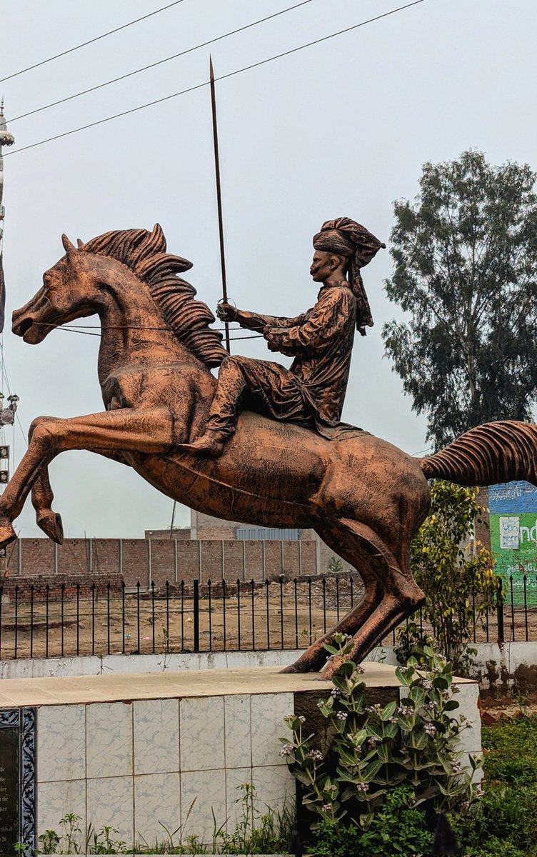 new sign board installed with the refurbished statue of the lionhearted Warlord of Sandal Bar, Dulla Bhatti (1547-1589)