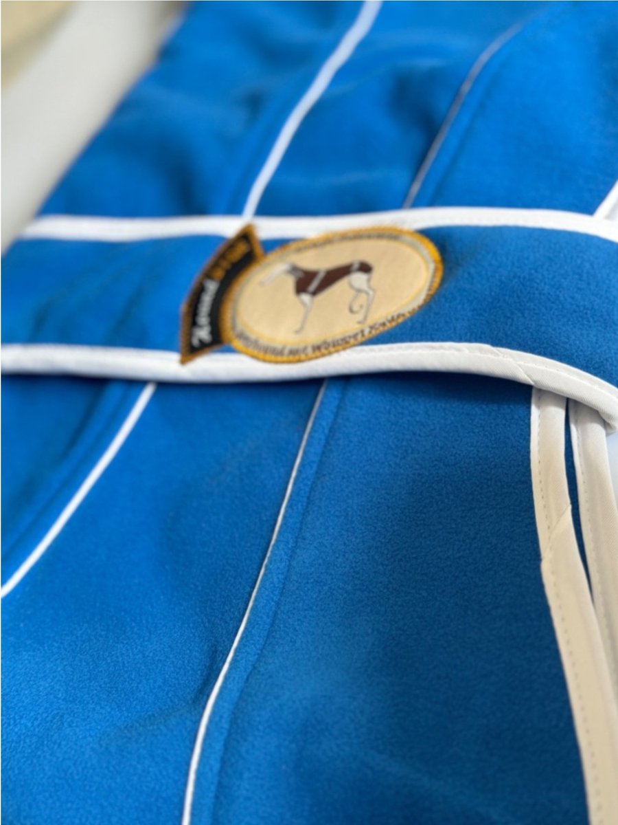 On sale now 🔔🔔🔔
Our Royal Blue fleece housecoat in greyhound sizes 26"+25"
Harness &amp; lead slots
Contrast white piping &amp; trim. Mid-length collar that can be turned over if required.
Gorgeous double thickness and the lining is matching royal blue.
Perfect for cooler
