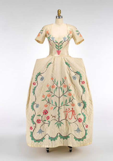 MadameGilflurt's tweet photo. When #GilbertAdrian discussed his 1947 "Pennsylvania Dutch" look with Vogue, he admitted that the #frockingfabulous number had been designed "purely for prettiness, for the big romantic moments." It's got Adam and Eve, the Tree of Life and even a little dog! Via the Met. #fashionhistory