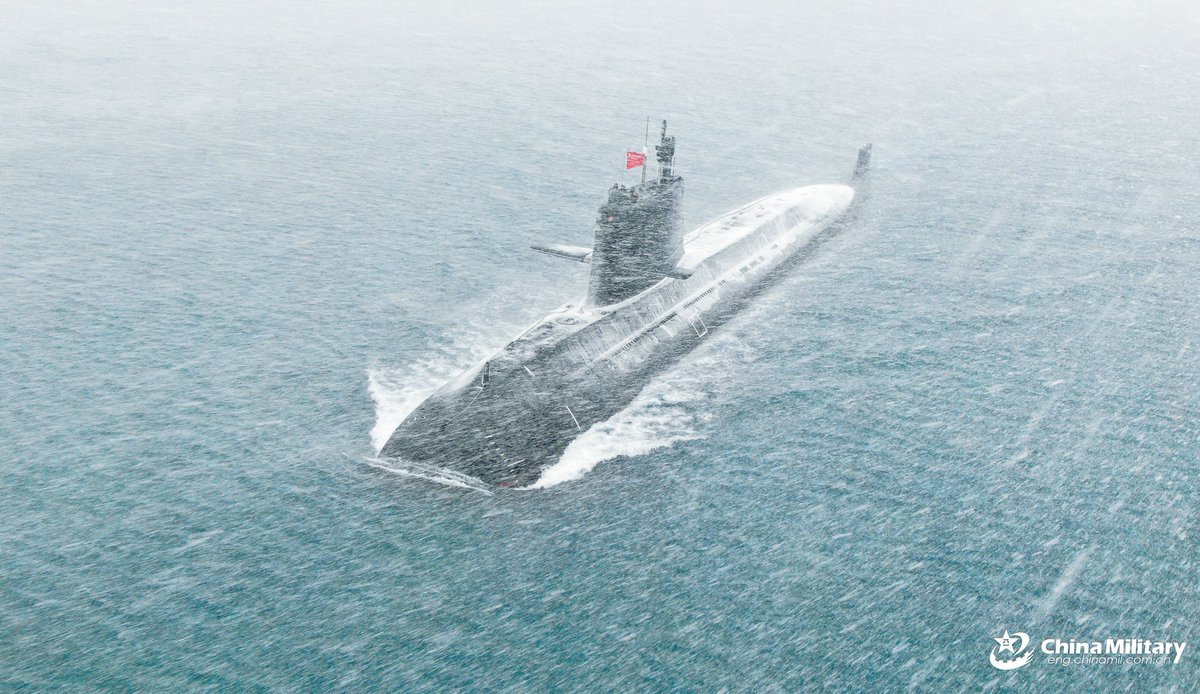 ChinaMilBugle's tweet photo. Snow-covered Sub Hull: #Photos show a naval #submarine attached to the Chinese #PLA #NorthernTheaterCommand participating in combat training. #Chinamilitary https://t.co/Hr3qSyqAgR