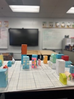"Some of our third graders are hard at work on their city planning project! They’re learning about the importance of government resources and how to use scale to create accurate maps. Future urban planners in the making! 🌆 #CityPlanning #Education