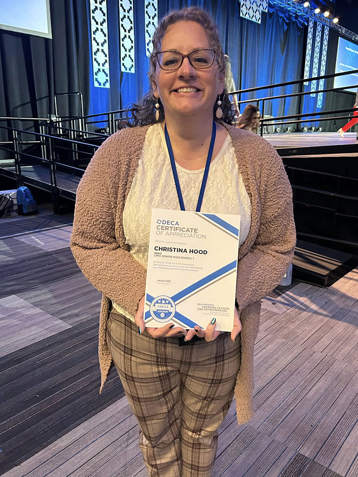 Congrats to Chrissy Hood, honored at the state DECA Competition for her 20 years of service as a DECA advisor, all of those years serving Lima Senior DECA.