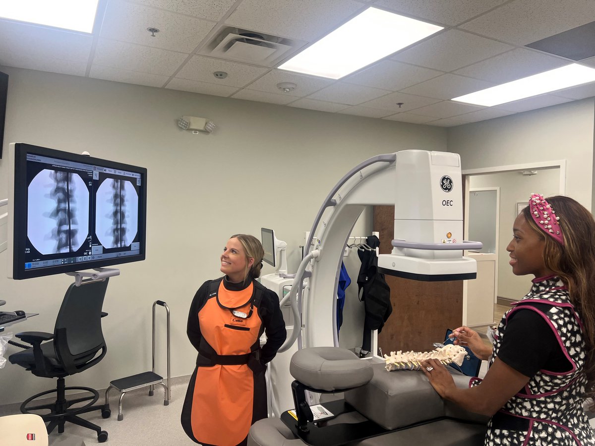 Dr. Janelle McNeil-Masuka, MD, one of our amazing fellows, is reviewing the different fluoroscopic angles and views to optimize visualization for interventional spine procedures. Caitlyn Smith, RT also sharing her in the teaching and the learning.