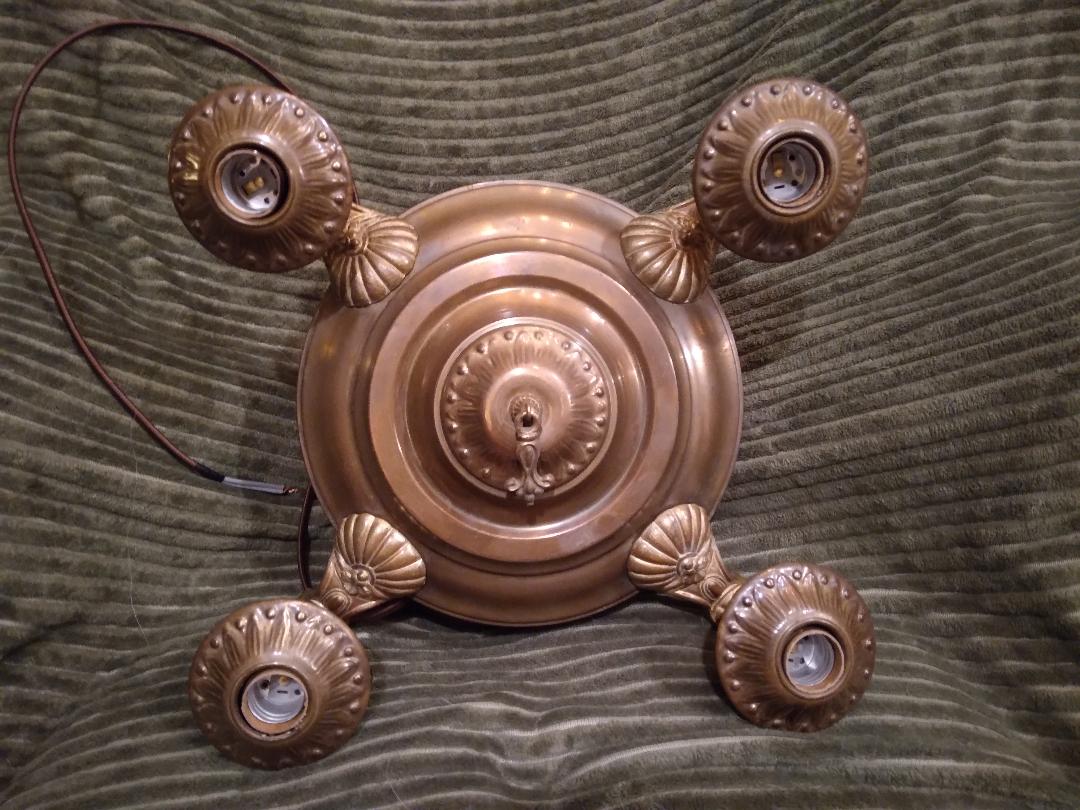 SOLD!💡
Antique four-socket brass pan chandelier with original finish.  New wiring throughout, new sockets, and new insulators.  Features reproduction metal paddle switches and new Rayon-covered wiring, lead to ceiling.