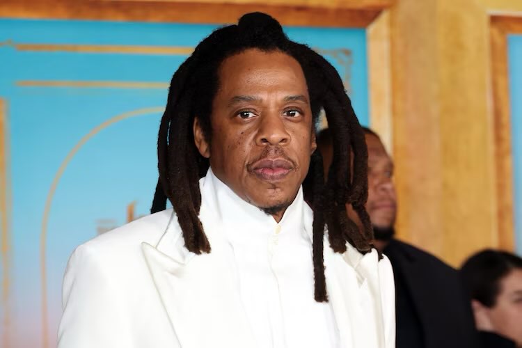 The woman who said she was 13 when Shawn "Jay-Z" Carter and Sean "Diddy" Combs sexually assaulted her after the 2000 MTV Video Music Awards is heard on a recording agreeing Jay-Z did not assault her and saying her lawyer pushed her to sue Jay-Z.
