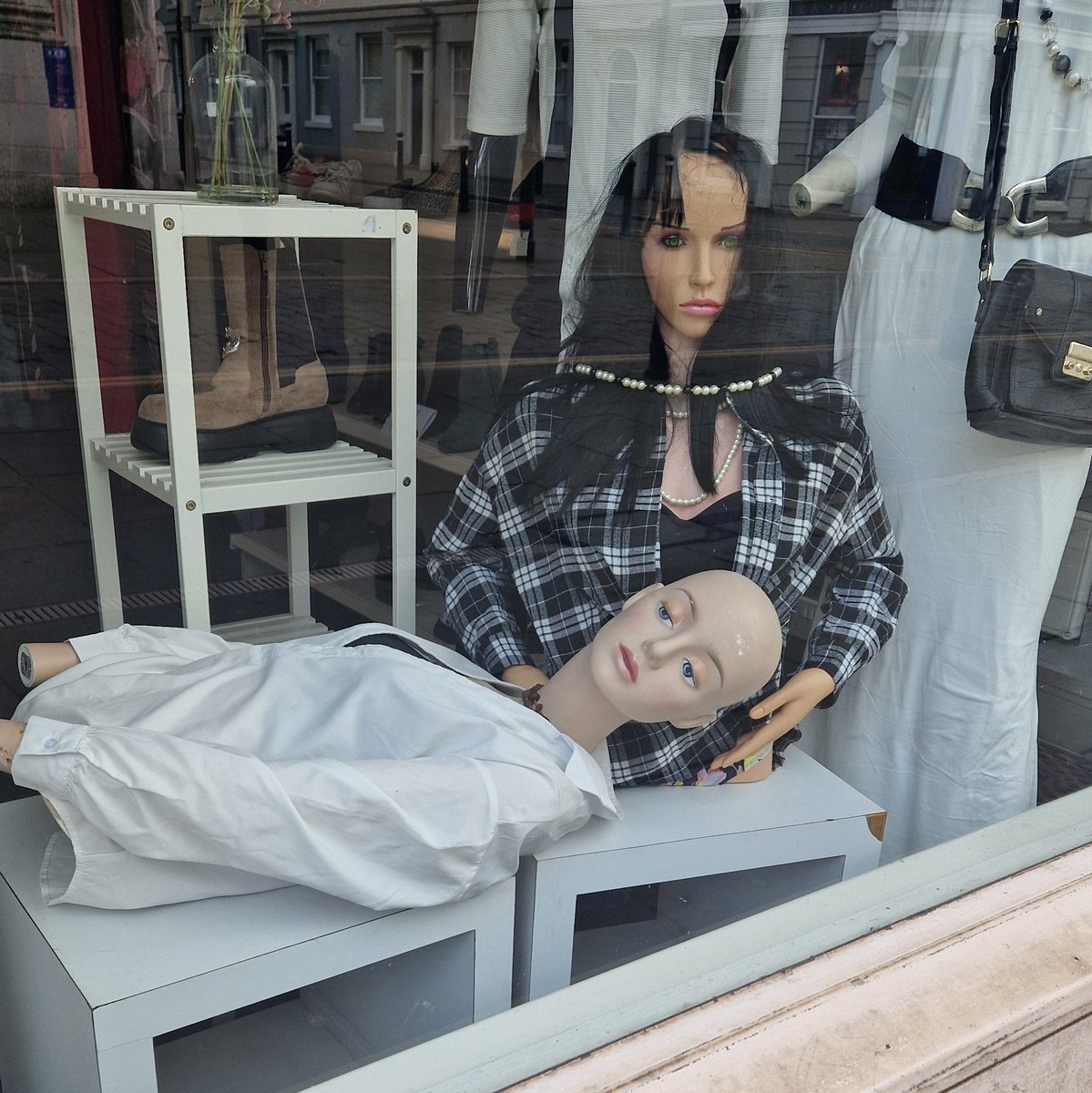 Charity shop window display appears to depict Alexander Litvinenko being nursed by his wife following his radiation poisoning.