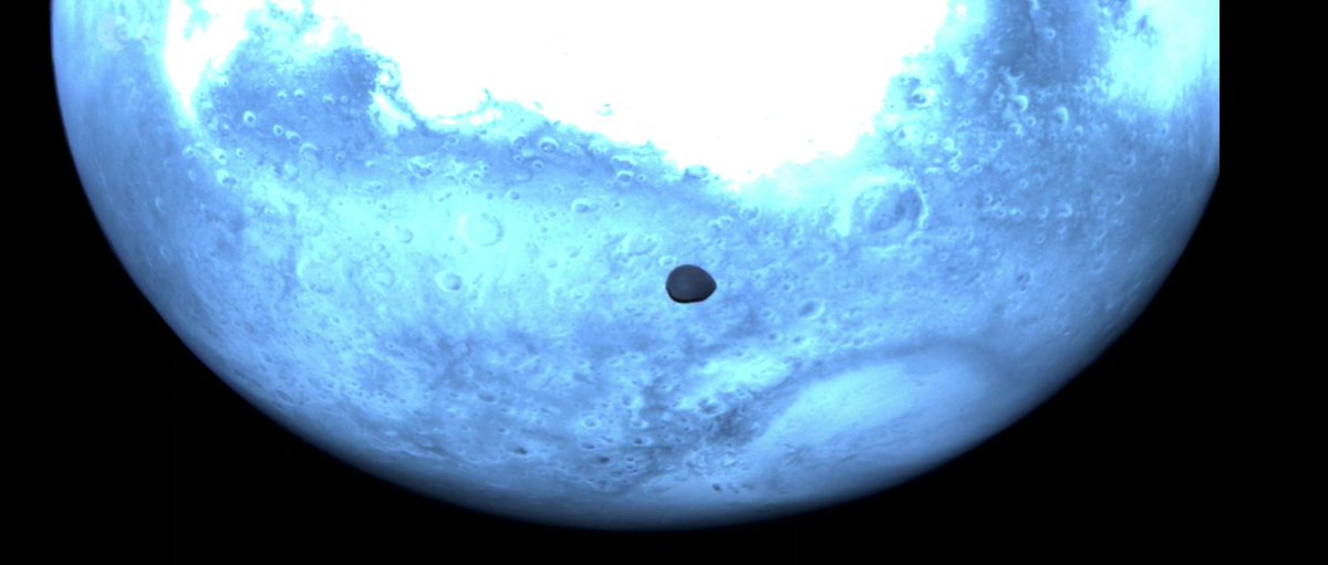 Epic image of Deimos above Mars from the ESA Hera spacecraft's HyperScout H imager