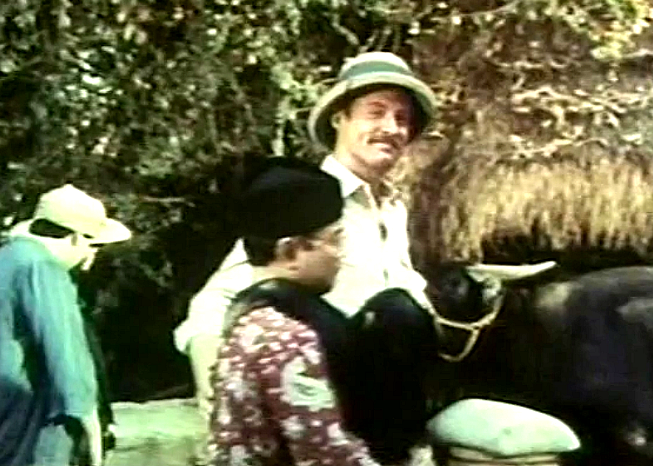 BoxfanStill's tweet photo. Bruce Boxleitner
Bring Them Back Alive - Episode 16 
@boxleitnerbruce @BruceItalian @fanofBoxleitner @clydekusatsu  #RonONeal 
Just the facts: Episode 16 is titled Dead Run. Frank (Bruce), and a female photographer from National Geographic are captured by Banjee tribesmen. To their surprise, an ex-convict called Harry Larkin leads the tribe.

Fact: The series was filmed in California, and some  exterior shots of pilot were filmed in Hawaii.