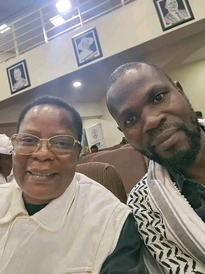 Hon Betty Nambooze Bakireke (@honnambooze) on Twitter photo At the tally center with my brother <a href="/EliasNalukoola/">Luyimbazi Nalukoola</a>. Victory is surely on our side✊🏿. At the tally center with my brother <a href="/EliasNalukoola/">Luyimbazi Nalukoola</a>. Victory is surely on our side✊🏿.