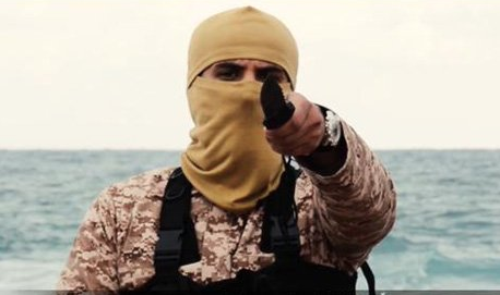 The image embraced (on left) by Moqdad Fatiha -- the operational leader of #Syria's #Alawite pro-#Assad resistance -- is eerily similar to the most notorious #ISIS killers, like 'Jihadi John' (on right) here.

Just an observation.