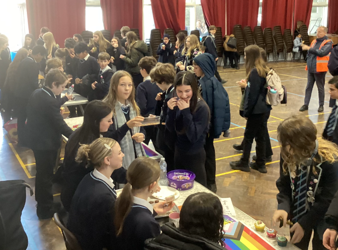 HpsHove's tweet photo. Students from the Year 7 and 8 equalities groups organised a rainbow bake sale to raise money for Stonewall, a charity that advocates for the LGBTQ+ community. https://t.co/xjlucYtpJc