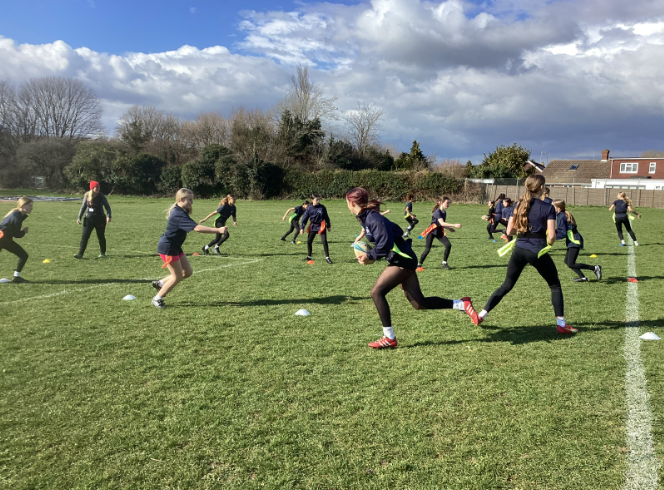 HpsHove's tweet photo. Girls from Year 7 and 8 took part in a Try Tag rugby taster session today. They developed passing and running skills and ended with a very competitive game of tag! https://t.co/glHzYFJ2jj