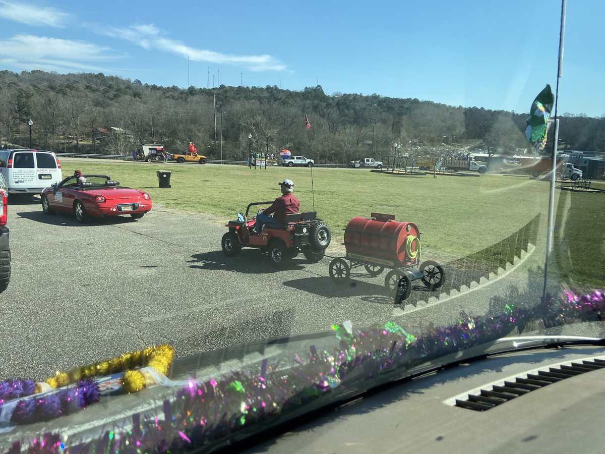Having Mardi Gras parade fun on a warm &amp; sunny Saturday in Wetumpka! 🥳We’re for hire (my mom and me) for your decorating needs 😂