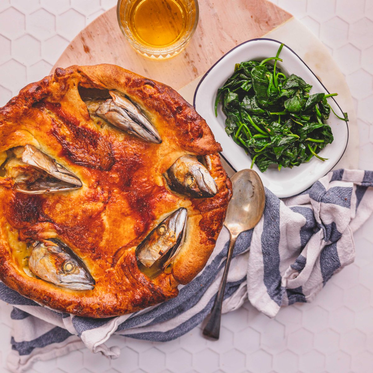 As St Piran's Day approaches, we're celebrating one of  Cornwall's most iconic dishes-the Stargazey Pie! Today, this rich and flaky pie, made even better with our salted butter and luxurious Cornish clotted cream remains a strong part of Cornish tradition. shorturl.at/6cS5t