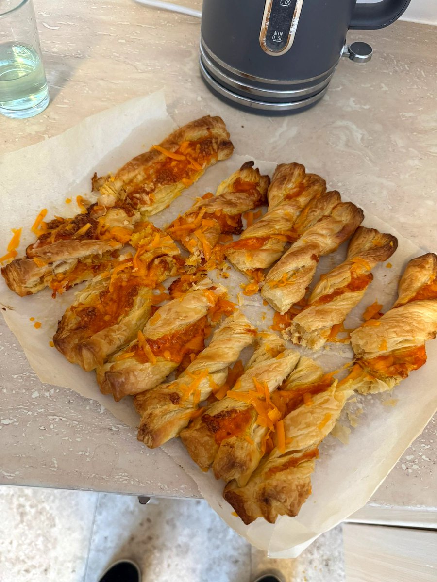 Just pulled these homemade cheese straws out of the oven, and wow, are they delicious! 🧀✨ There's nothing quite like the taste of freshly baked treats. Who needs store-bought when you can whip up your own? 😋🥖 #AutismAdults #HomemadeGoodness #BakingJoy #CheeseStraws