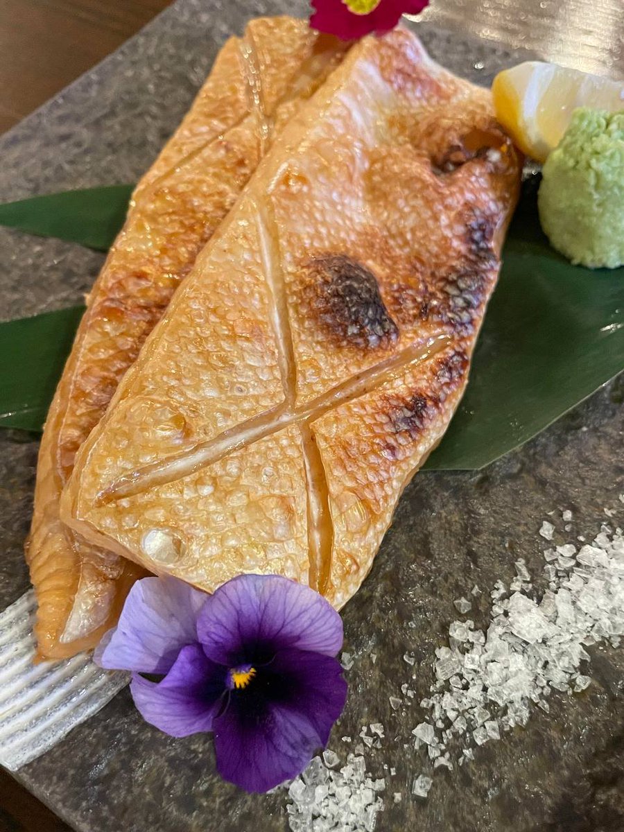 Design_maker21's tweet image. Savoring a beautiful Japanese meal: grilled eel (unagi) with a perfect glaze, served with lemon and wasabi, alongside vibrant sushi rolls featuring tuna, salmon, and shrimp, with pickled ginger on the side. A true taste of elegance!