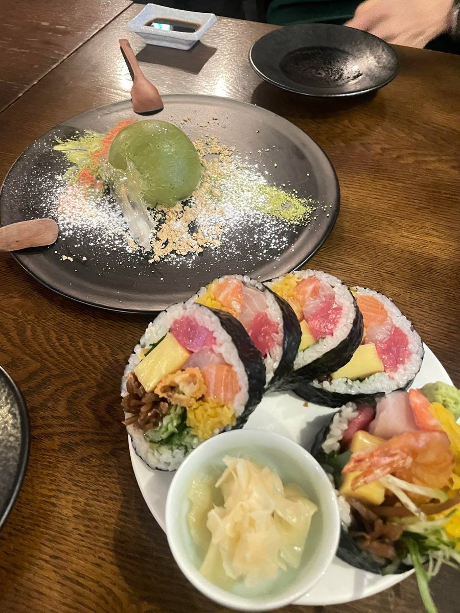 Design_maker21's tweet image. Savoring a beautiful Japanese meal: grilled eel (unagi) with a perfect glaze, served with lemon and wasabi, alongside vibrant sushi rolls featuring tuna, salmon, and shrimp, with pickled ginger on the side. A true taste of elegance!