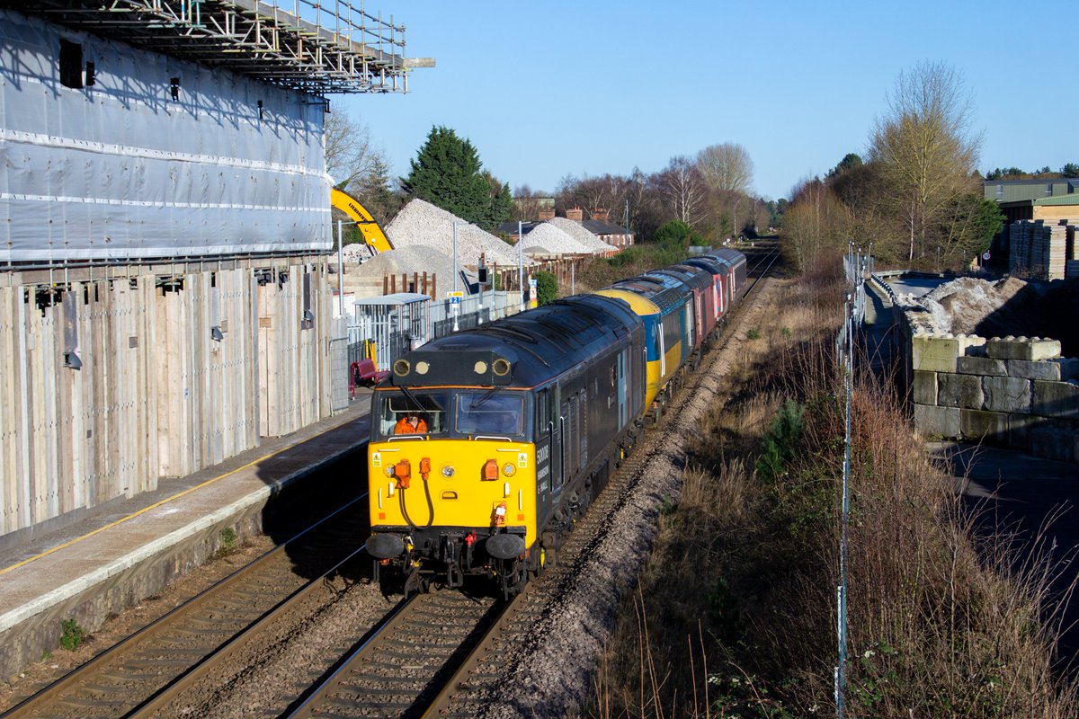 50008 + 43112 + 43238 + 43319 + 10115 5M43 Dereham to Burton-on-Trent at Brandon

With new of my second favourite train, 43238 "The Flying Tomato" being moved, I knew I couldn't miss it.

50008 leads Romnic Ex-LNER 43112, 43238 and 43319 with one MK3 towards Burton-on-Trent.