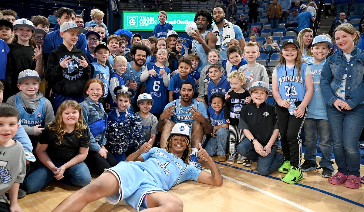 Indiana State players Josiah LeGree, Jaden Daughtry, Samage Teel and Aaron Gray pose for a photo with their young fans after the Sycamores defeated Southern Illinois on Sunday at Hulman Center. Read the story at Tribstar.com. <a href="/IndStAthletics/">Indiana State Athletics</a> <a href="/IndStBasketball/">Indiana State Basketball</a>