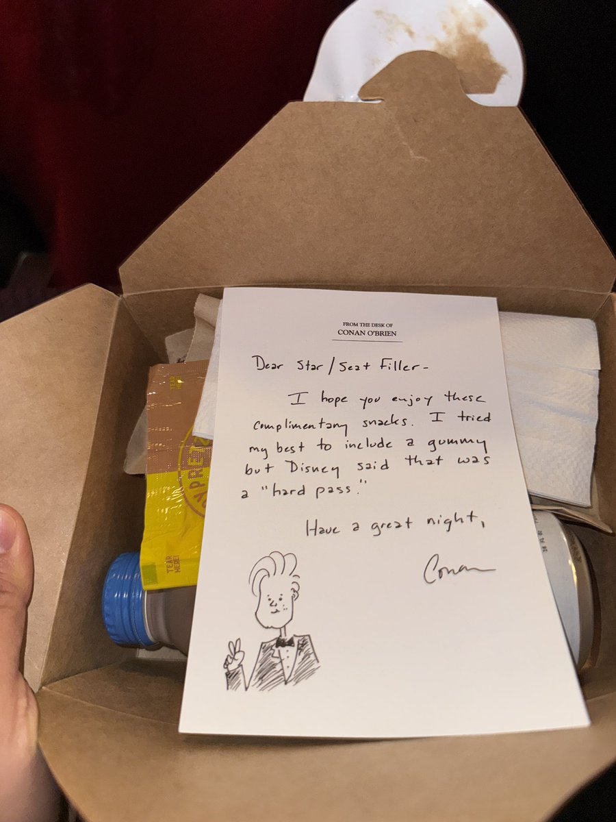 There’s a note from Conan under every #Oscars seat with a snack box of water and a pretzel.