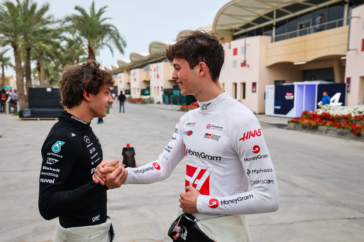 A glimpse of Ollie and me during pre-season testing. We used to share a garage as teammates, but now we're facing off from rival teams. The competition is fierce on the track, but away from the circuit, our friendship remains as strong as ever. Different colors, same bond.