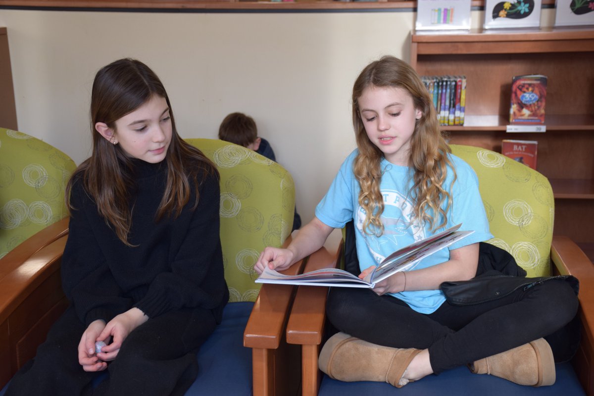 esm_csd's tweet photo. EES celebrated Read Across America Day by reading a favorite or new book and participating in literacy activities throughout the day. Older students read to younger students and teachers made extra time to read to students. Students also collaborated on a Seuss Sock craft. https://t.co/5tuy7jO5bb