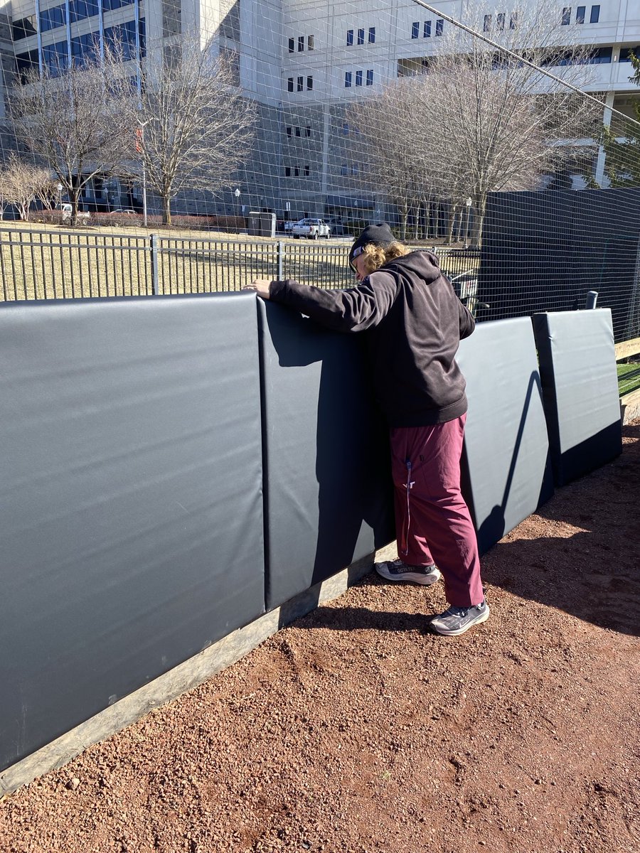 Emerson, Zach, Dakota, and Sam putting the newly re-covered pads on the Tech Softball Park.