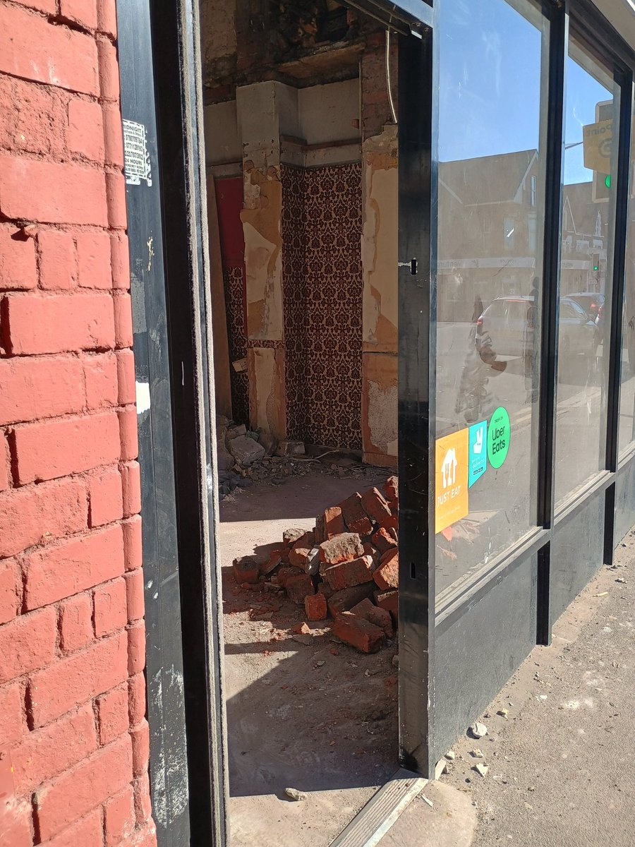 Historical, original flock wallpaper exposed during the renovation of ash old Indian restaurant in Roath.