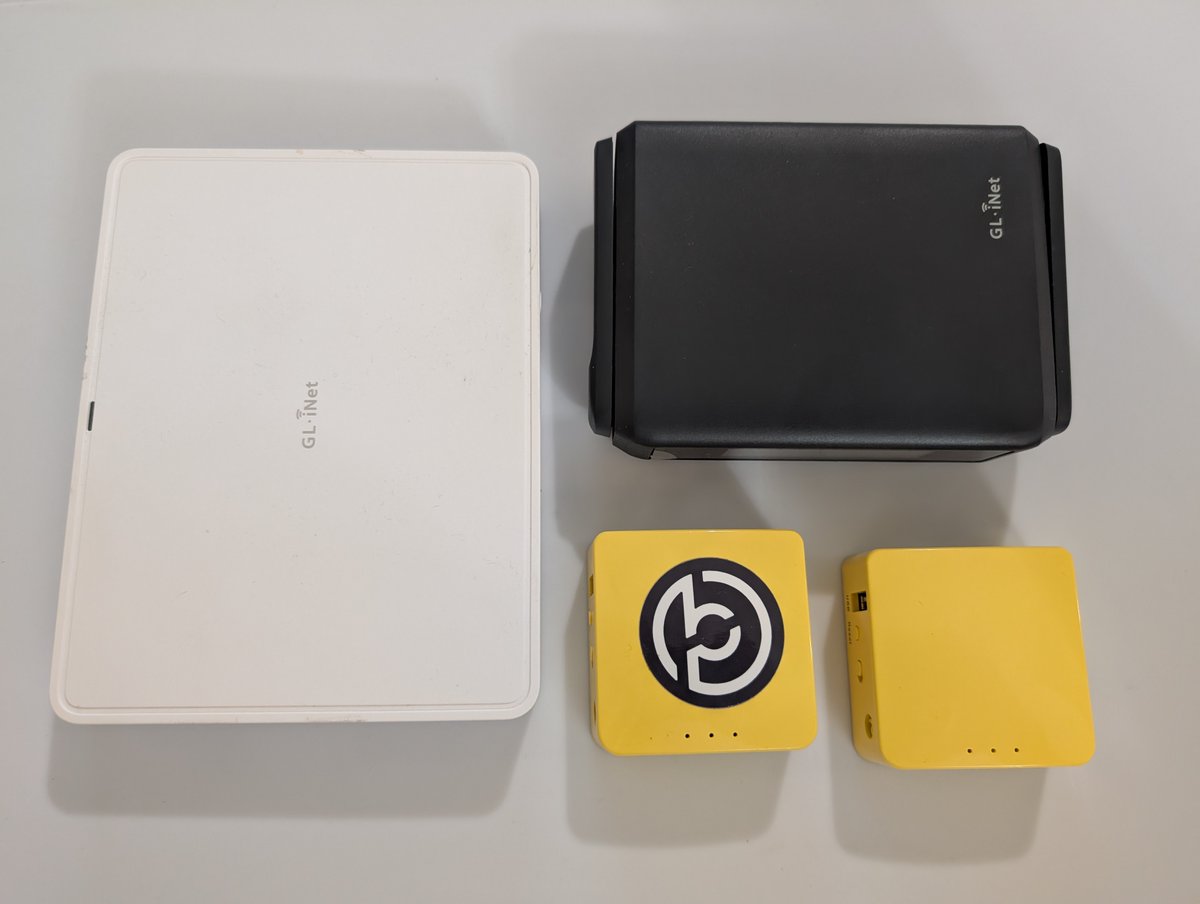 vojimen's tweet image. Just showing off some of my @GLiNetWiFi gadgets (routers).

In the picture:
- Marble
- Slate 7
- 2x Mango (the @Blokpax sticker on one helps me identify which is which).