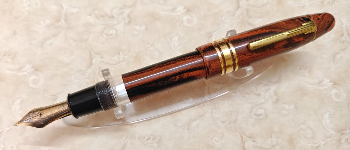 Finished up: custom pen in Conway Stewart woodgrain ebonite. This is a piston filler pen and uses an original Montblanc 149 section.