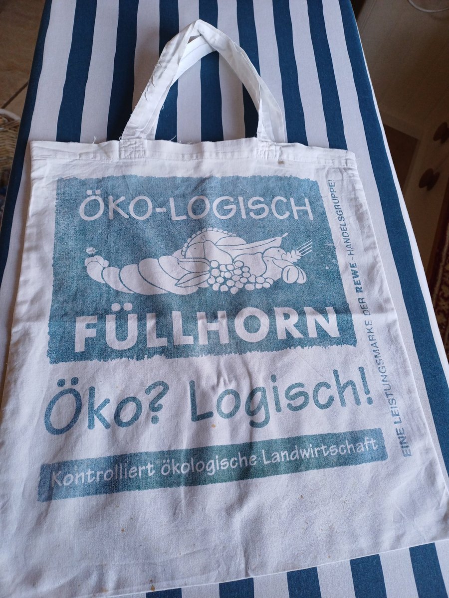 Just washed my peg-bag. I love it. Bought in Germany in the 70s or 80s. Rather thin now. Thought I'd better take a photo before it fades away.