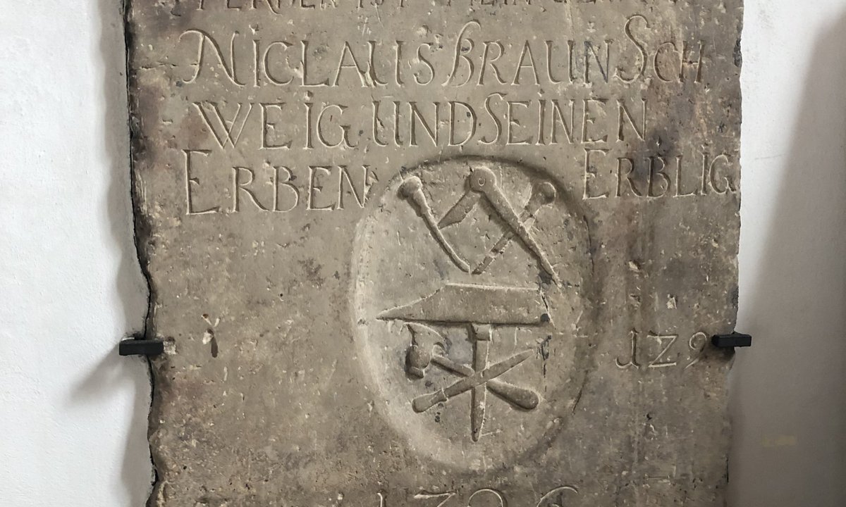 Masonic symbol carved in stone in St. Peter's church in Riga, Latvia