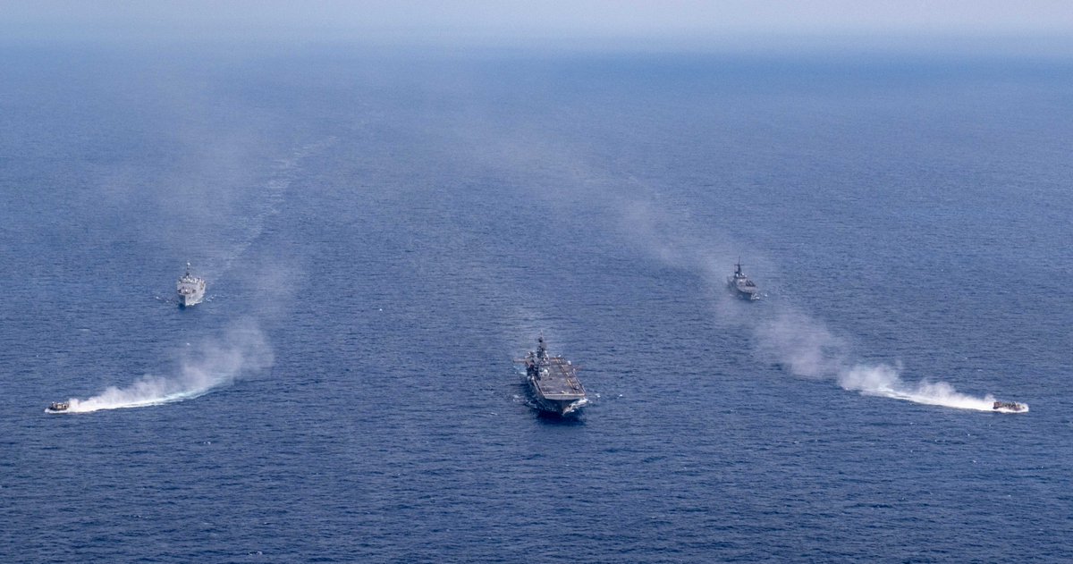 USNavy's tweet photo. The America Amphibious Ready Group and 31st Marine Expeditionary Unit are participating in Iron Fist, an exercise with the Japan Ground Self-Defense Force in the East China Sea. #TeamBlueGreen is sharpening our warfighting and lethality to stay ready for any challenge. https://t.co/UY8FVzF3kq