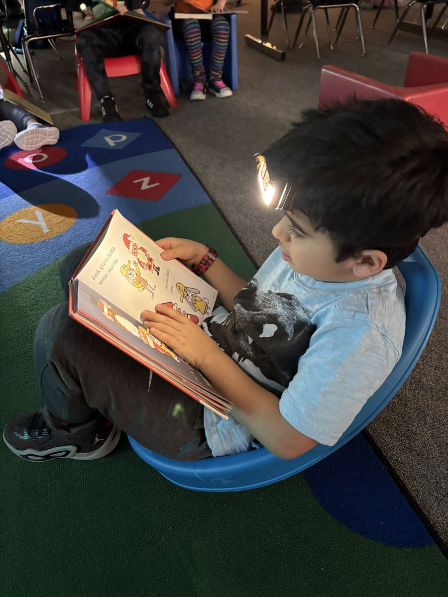 Kinders had a very illuminating choice reading time today! #flashlights #ReadAcrossAmericaWeek