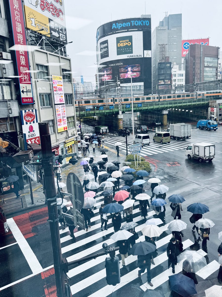 Tokyo rush hour as viewed from drug store in Shinjuku