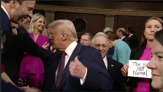 New Mexico's <a href="/Rep_Stansbury/">Rep. Melanie Stansbury</a> holds up a sign reading "This is NOT Normal" as President Trump enters to give his address to congress. <a href="/krqe/">KRQE News 13</a> #nmpol
