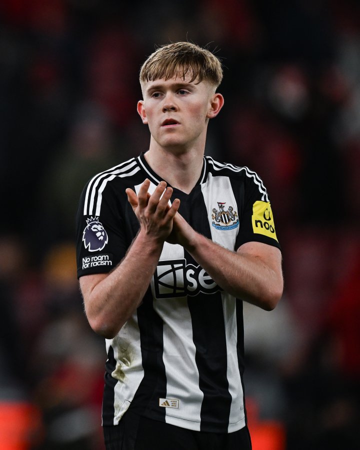 Lewis Hall claps the fans