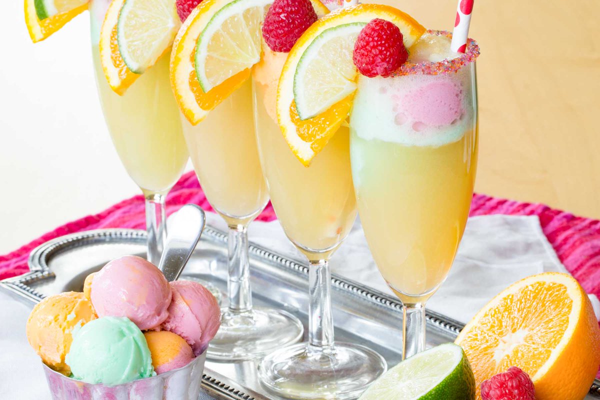 Rainbow Sherbet Floats are a fun, bubbly treat with colorful sherbet and sparkling cider. Easy to make and perfect for spring holidays or any celebration. Add festive garnishes for extra fun! #RainbowSherbet 
l8r.it/WV4f