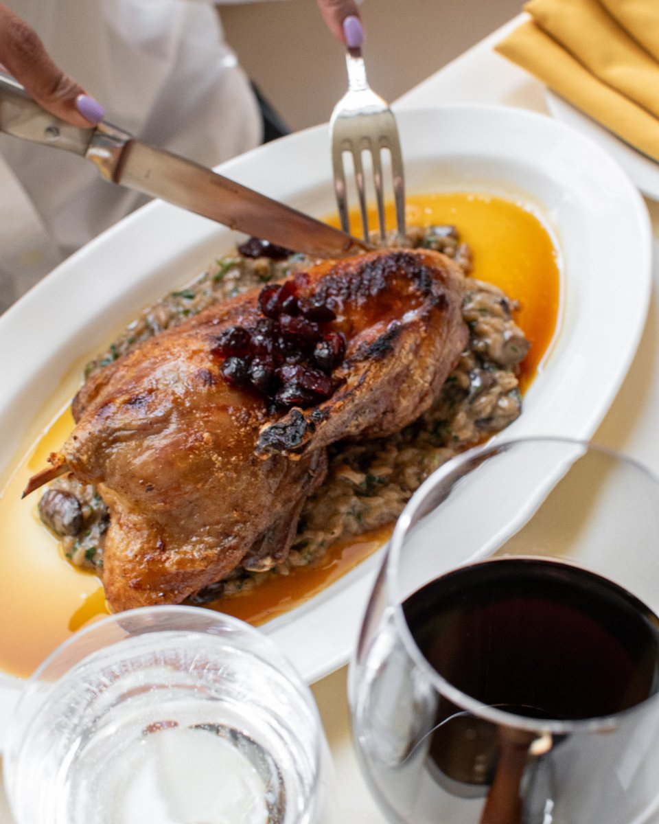 Half "Whole Roasted" Duck - a dish that needs no introduction. Accompanied by Wild Mushroom Risotto and Dried Cranberry Gastrique.