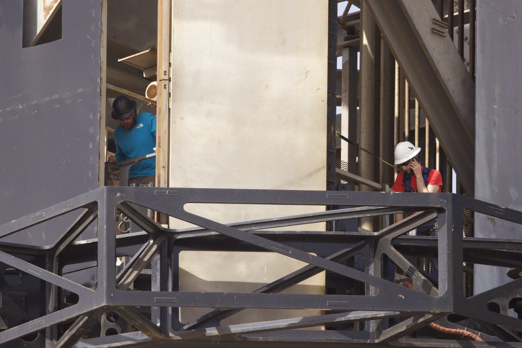 SpaceX crew inspecting the chopsticks carriage