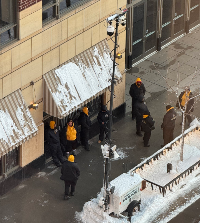 CrimeWatchMpls's tweet photo. Downtown Minneapolis "violence interrupters" keeping the sidewalk warm right under the police camera 🙄🤡

Million$$$$$$ we've spent on the boondogglery. https://t.co/atiY1SqoLX