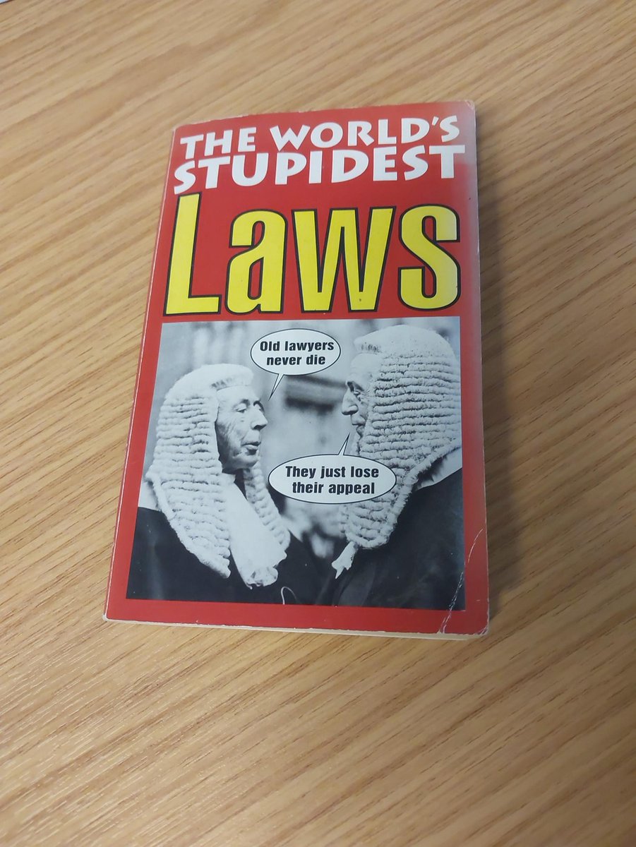 Happy #WorldBookDay What's your go to book. 

A snippet from a book in the office reads "It is against the law to eat mince pies on the 25th December".