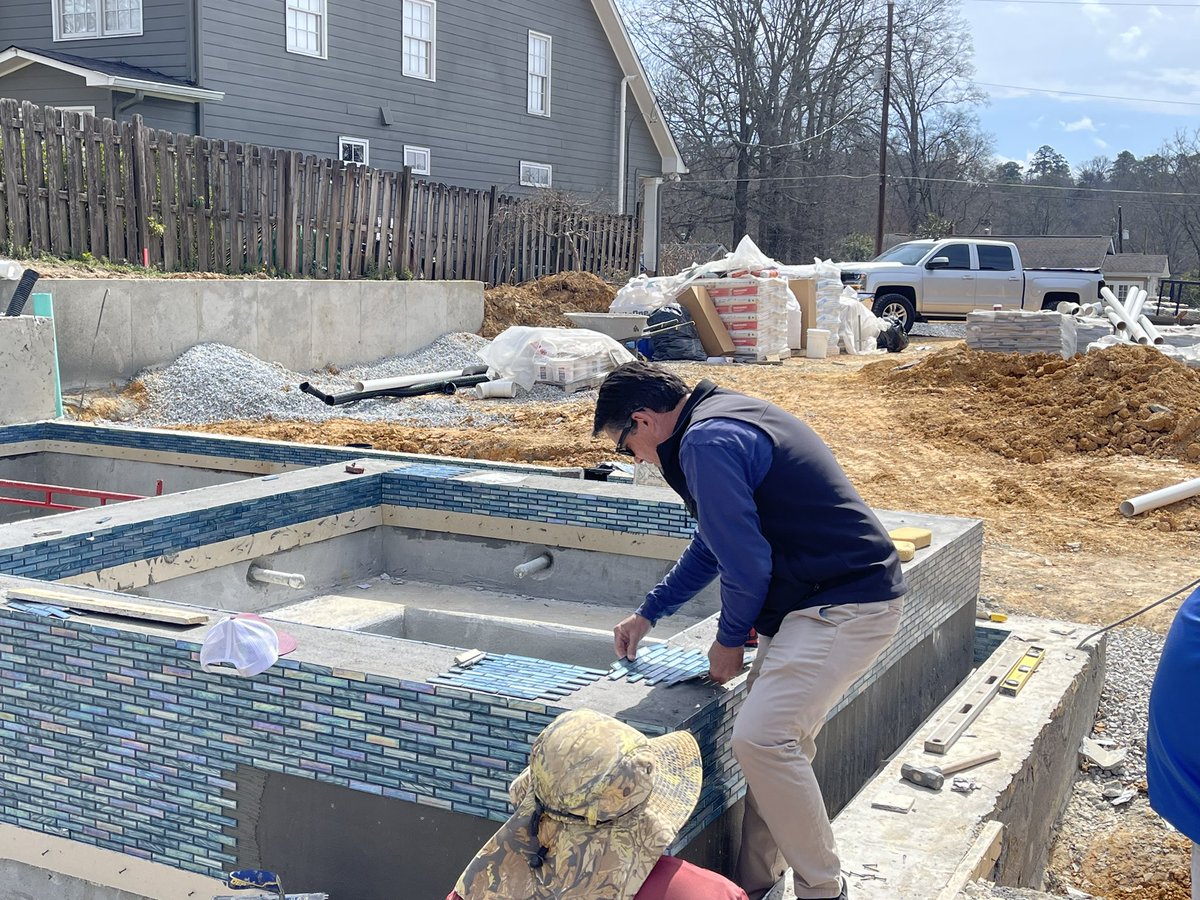 chip_pool_man's tweet image. Laying tile on a pool and spa.