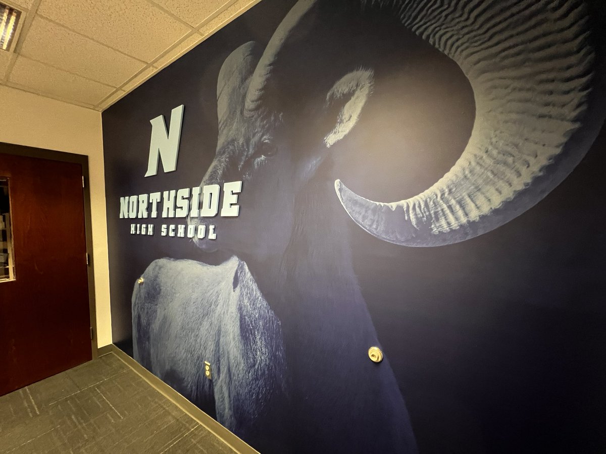The completion of Phase 1 at Northside High School boasts an impressive full wall wrap with 3D lettering in the conference room, a full entrance wrap, and a custom wall of fame specifically designed to acknowledge students' remarkable academic successes.