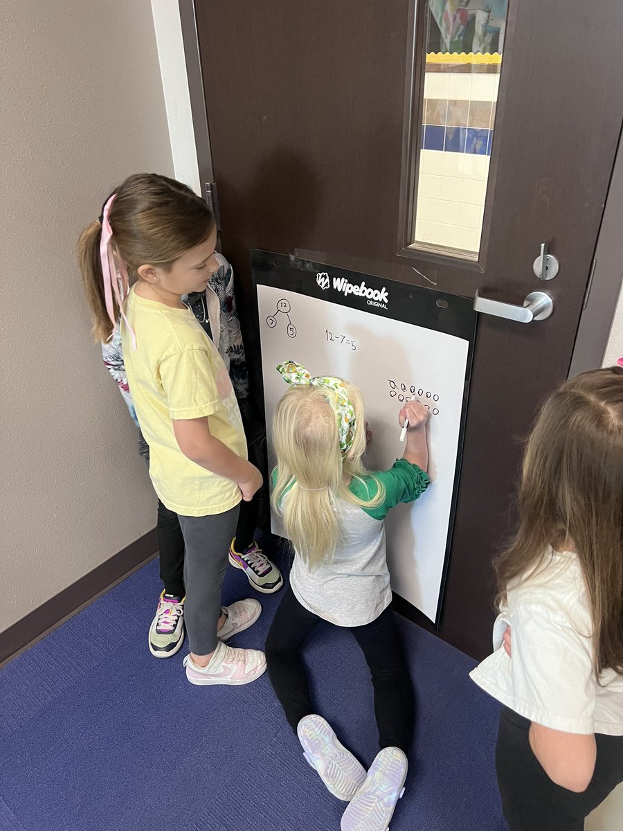 Engagement and collaboration were high during our problem solving WIN time with vertical boards!